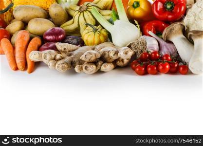 Harvest of many vegetables isolated on white background border frame with copy space for text. Harvest on white background
