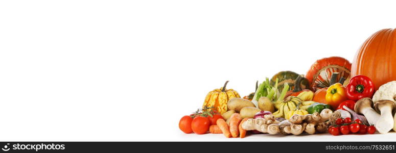 Harvest of many vegetables isolated on white background with copy space for text. Harvest on white background