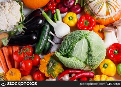 Harvest of many vegetables , top view flat lay background. Vegetable harvest background