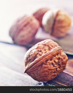 harvest of wallnuts on the wooden table