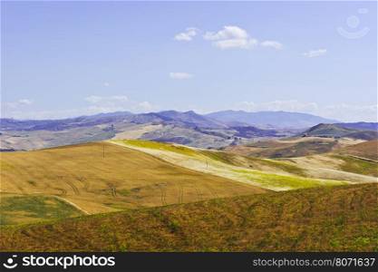 Harvested Wheat Fields on the Hills in Sicily