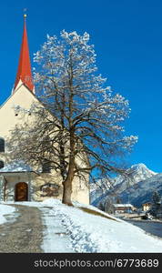 Haselgehr village and Catholic parish church St. Martin. Winter view (Austria, Tirol). 1689 a chapel was named in Martin Unterhof. 1704 took place a new building.