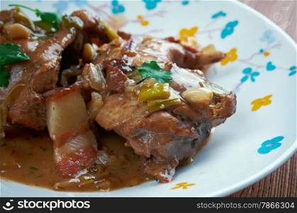 Hasenpfeffer - traditional German stew made from marinated made from wine rabbit with onions.