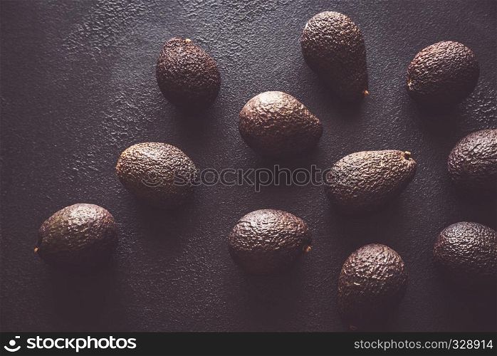 Hass avocados on the dark background