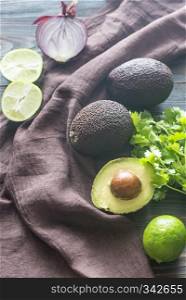 Hass avocados with ingredients for guacamole