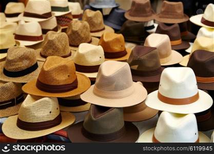 Hats in outdoor store stacked in a row