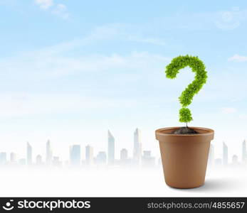 Have question. Image of plant pot with green question mark