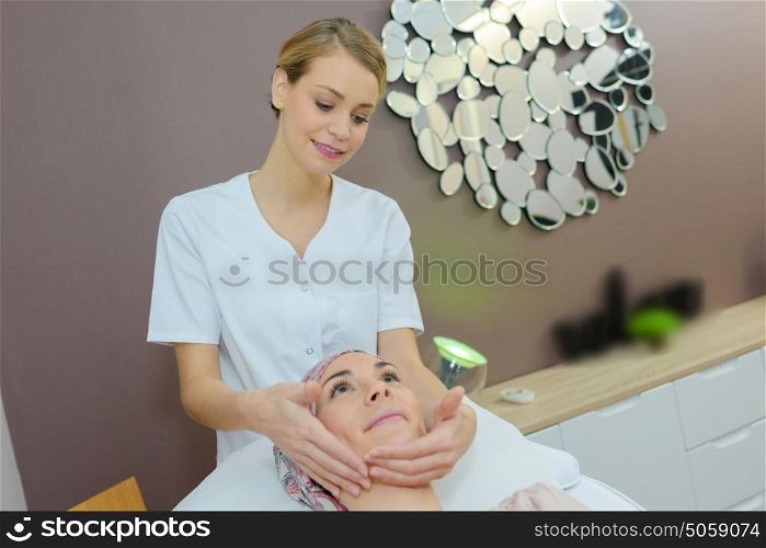 having a facial massage
