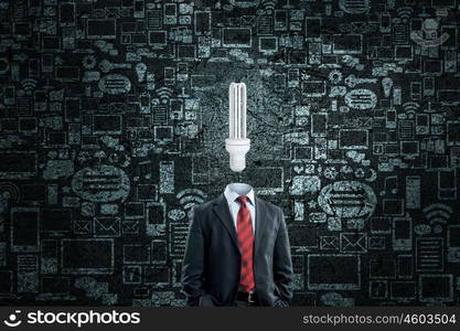 Having great idea in head. Idea concept with businessman and light bulb instead of his head