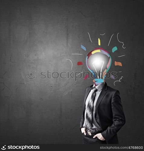 Having great idea in head. Idea concept with businessman and light bulb instead of his head