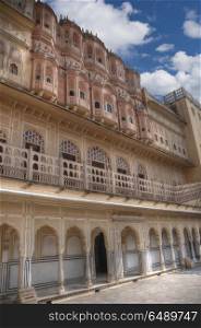 Hawa Mahal is a harem in the palace complex of the Jaipur Maharaja, built of pink sandstone in the form of the crown of Krishna. Hawa Mahal