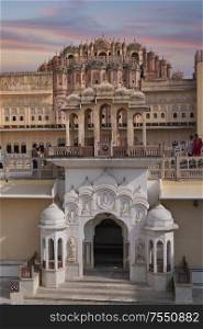 Hawa Mahal is a harem in the palace complex of the Jaipur Maharaja, built of pink sandstone in the form of the crown of Krishna