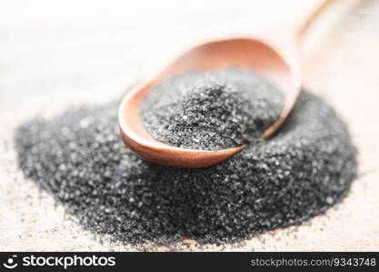 Hawaiian black  lava sea salt .  Healthy food concept. Speciality salt. Food background