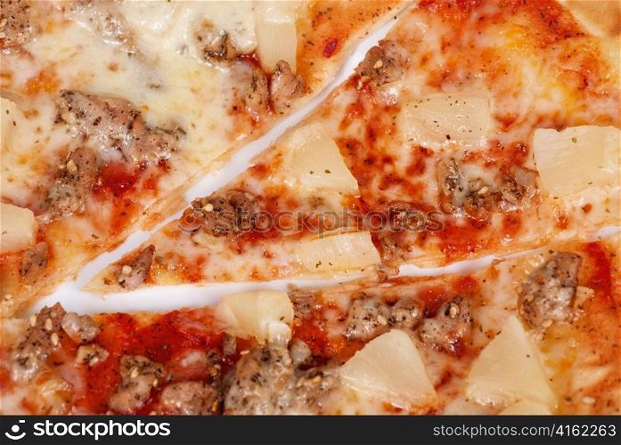 Hawaiian pizza with roasted chicken, pineapple, garlic and mozzarella cheese