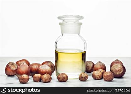Hazelnut oil isolated on white background for Cosmetic or beauty care
