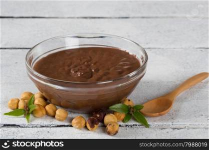 Hazelnuts delicious hot cream into a glass bowl