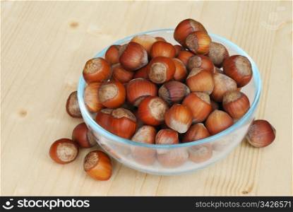 Hazelnuts on a wooden table. Hazelnuts