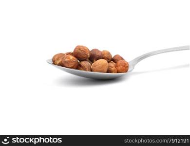 Hazelnuts on spoon