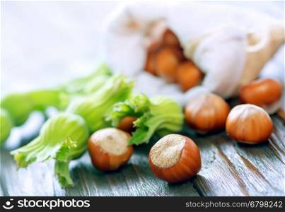 hazelnuts on the wooden table, autumn harvest of nuts