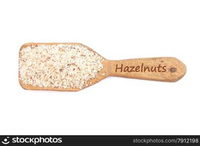 Hazelnuts powdered on shovel