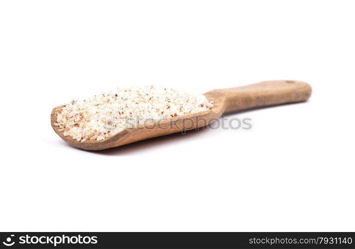 Hazelnuts powdered on shovel