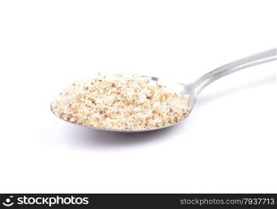 Hazelnuts powdered on spoon