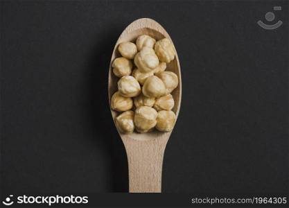 hazelnuts wooden spoon. High resolution photo. hazelnuts wooden spoon. High quality photo