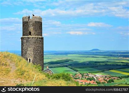 Hazmburk castle on a hill in Czech Central Mountains.