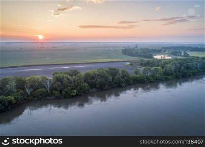 hazy sunrise over the Missouri River at Brownville, Nebraska