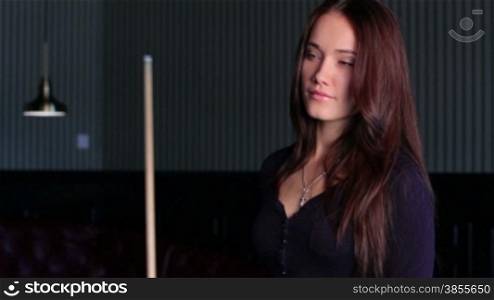 HD1080p: Beautiful Young Woman Flirting With The Camera In The Billiard Club.