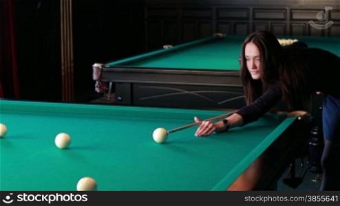 HD1080p: Beautiful Young Woman Playing Billiards.