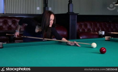 HD1080p: Beautiful Young Woman Playing Billiards.