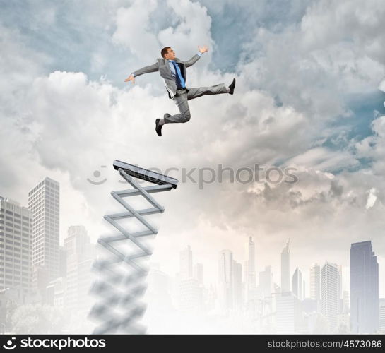 He did great career jump. Businessman jumping on springboard as progress concept