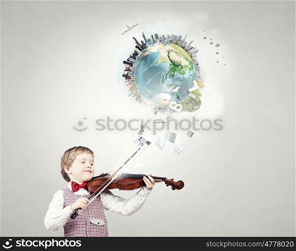 He is little talent. Adorable boy wearing red bowtie and playing violin. Elements of this image are furnished by NASA