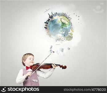 He is little talent. Adorable boy wearing red bowtie and playing violin. Elements of this image are furnished by NASA