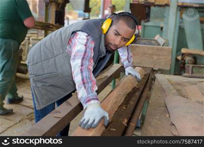 he is making block of wood