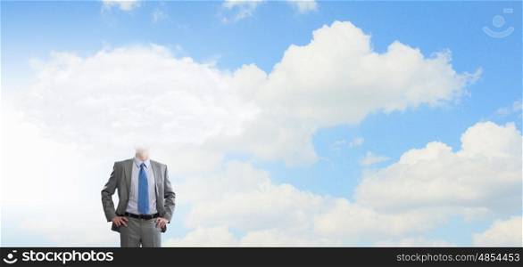 He is up in clouds. Young businessman with white cloud instead of head