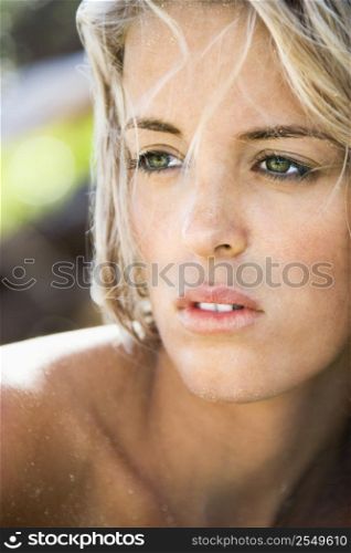 Head and shoulder portrait of pretty blond Caucasian woman.