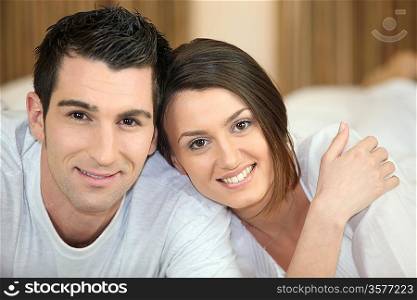 Head and shoulders of a relaxed young couple