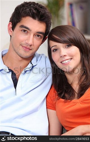 Head and shoulders of a young attractive couple