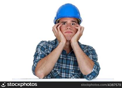 Head and shoulders of a young construction worker