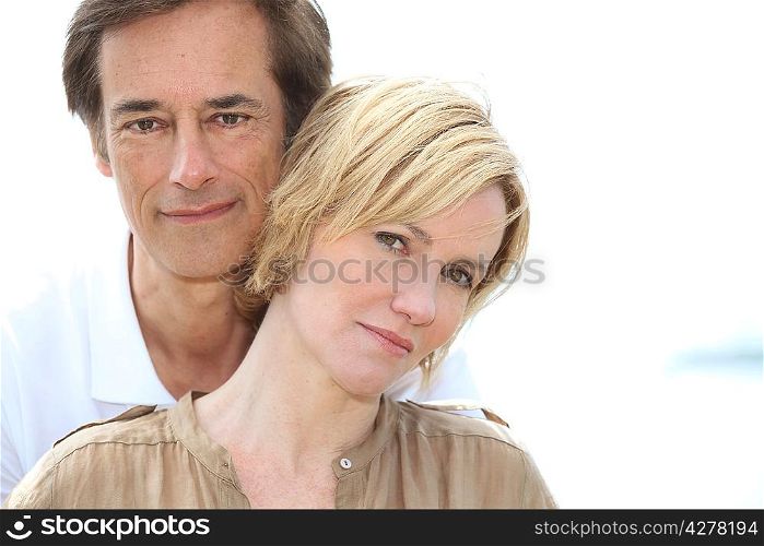 Head and shoulders of mature couple