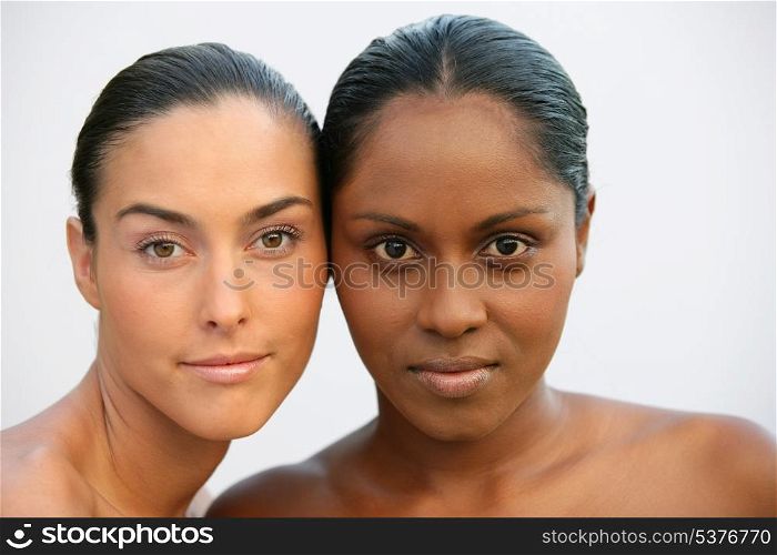 Head and shoulders of two beautiful women