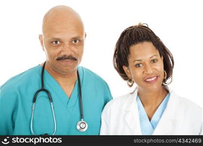Head and shoulders portrait of caring, african-american doctors. Isolated on white.