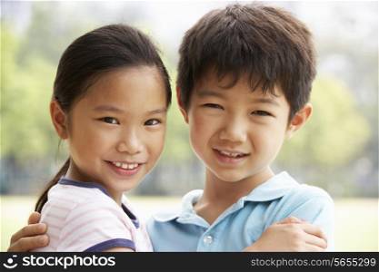Head And Shoulders Portrait Of Chinese Boy And Girl