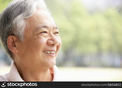 Head And Shoulders Portrait Of Senior Chinese Man