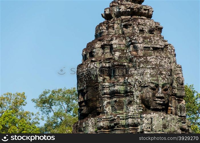 Head encarved in stone Bayon temple angkor. Faces of Bayon tample Ankor wat Siem Reap Cambodia