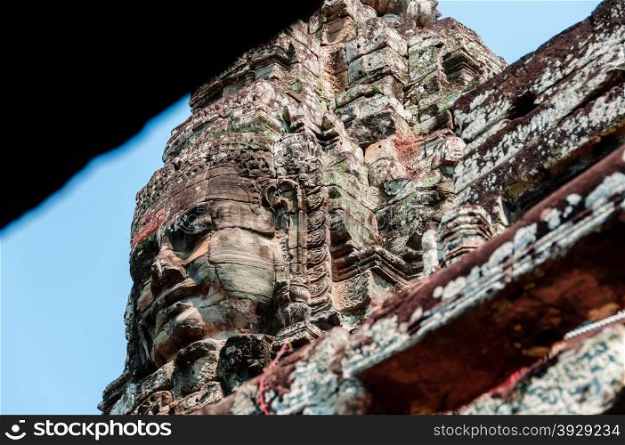 Head encarved in stone Bayon temple Angkor. Head encarved in stone Bayon temple Angkor Wat Cambodia