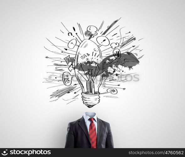 Head full of ideas. Unrecognizable businessman with light bulb instead of head