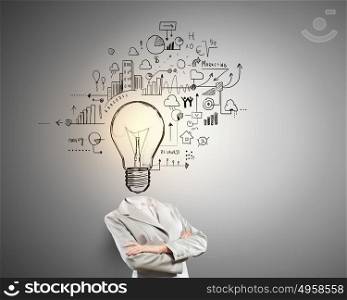 Head full of ideas. Unrecognizable businesswoman with light bulb instead of head